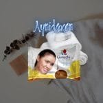 jabón de barra de DXN sobre sellado toalla blanca