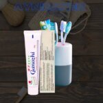 pasta dental caja sellada y pasta suelta con adornos de cepillo dental.