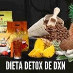 productos de DXN acompañados de frutas como la piña, coco, café.