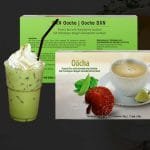 DXN Oocha en la caja más un vaso de té