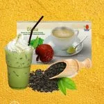 DXN Oocha en la caja más un vaso de té, con hojas de te Oolong.