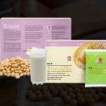 NutriZhi en caja y en sobre por unidad, vaso de leche de soya. Granos de soya