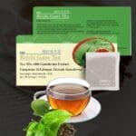 Reishi Gano Tea de DXN en presentación de caja con una taza de té, te unidad filtrante y te de Camellia Sinensis