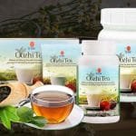 tres presentaciones del Oozhi Tea de DXN con una taza de té y hojas de té