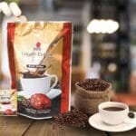 café 2 en 1 de DXN con granos de café